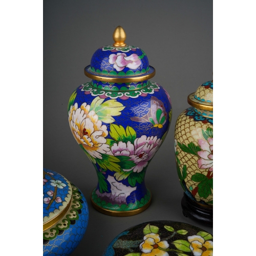 886 - Six pieces of 20th century Chinese cloisonne, comprising three vases and cover and three circular tr... 