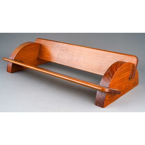 889 - An Art Deco style treen bookstand, bears Cannon Craft label to the underside, width 38cm