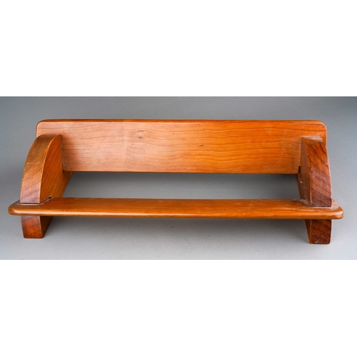 889 - An Art Deco style treen bookstand, bears Cannon Craft label to the underside, width 38cm