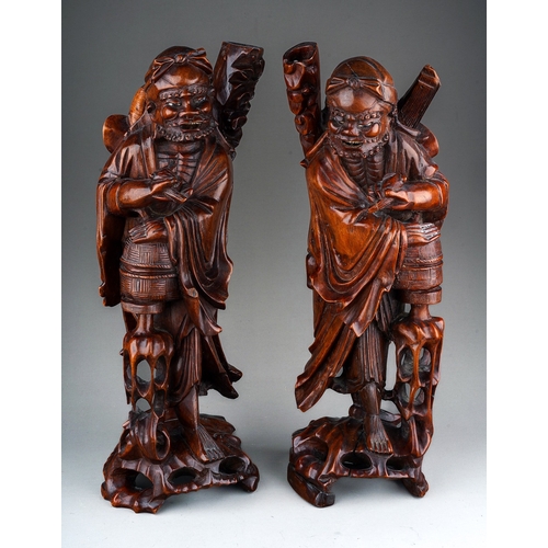 890 - Pair of 19th Century  Chinese hardwood carvings of elderly men with bone inlay detailing, approx. 42... 