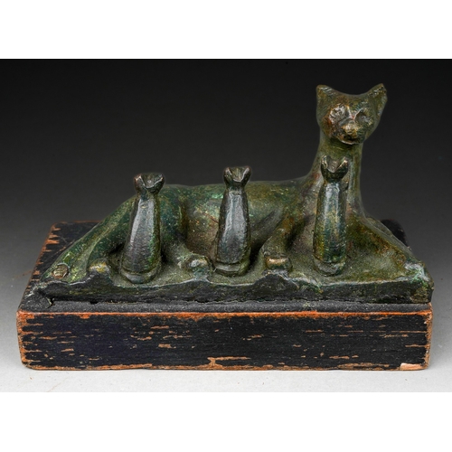 896 - Bronze Bastet cat and kittens Egyptian Artefact. 
The mother lying on her left side with her legs pa...