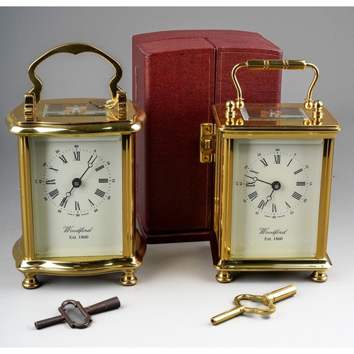 966 - Two brass cased carriage clocks retailed by Woodford one with travel case. (2) keys in boxes.