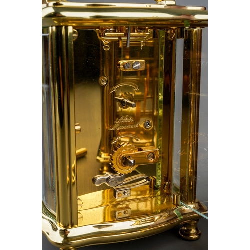 966 - Two brass cased carriage clocks retailed by Woodford one with travel case. (2) keys in boxes.