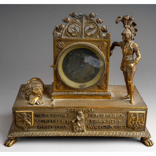 967 - A late 19th century gilt probably Austrian metal figural mantel clock, the central gothic arched cas... 