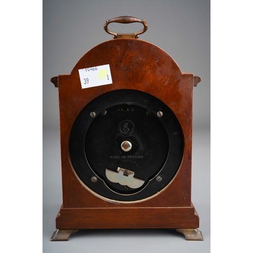 969 - A Modern English simulated walnut mantle clock, brass dial with Roman numerals stamped An Elliot Clo... 