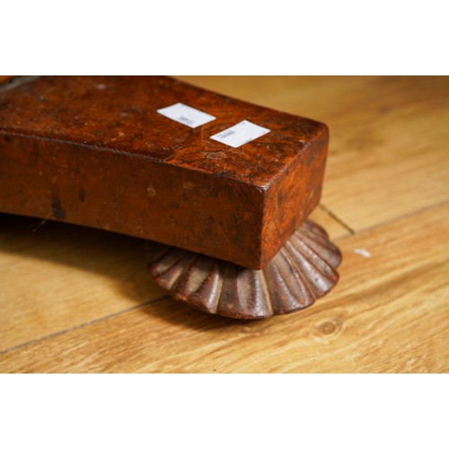 976 - An early Victorian burr oak occasional table, the circular top with eight divisions, on a reduced tr... 