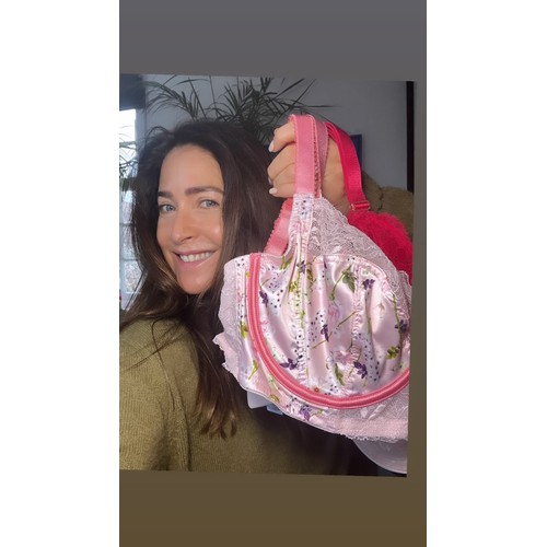 736 - An Angel Keyring made from the fabric of Lisa Snowdon's pink bra and silver metal findings.
Approx s... 