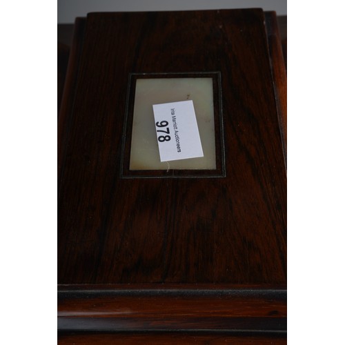 978 - A Victorian rosewood table top sewing cabinet, hinged caddy top with mother of pearl cartouche, the ... 