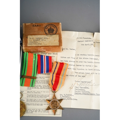 77 - WWII medals to include: 
1. O.H.M.S box addressed to  W R Bamber Esq including The Africa Star and r... 