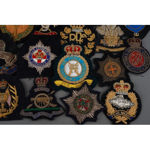 91 - A collection of Veterans Wire Bullion Embroidered Blazer badges, Royal Navy, Army and RAF. To includ... 