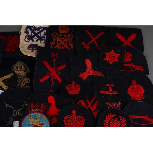 93 - A collection of cloth ERII era Royal Navy Trade and Rank Insignia, some in wire bullion embroidery.