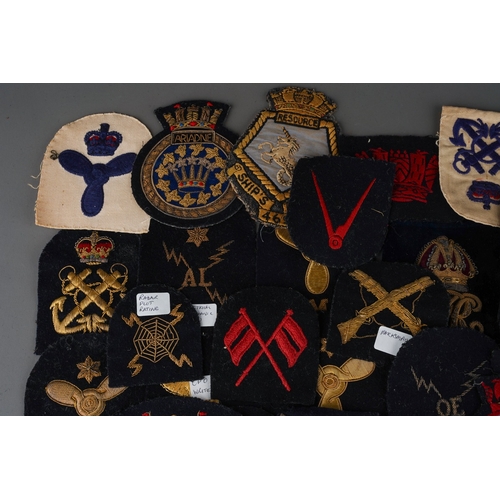 93 - A collection of cloth ERII era Royal Navy Trade and Rank Insignia, some in wire bullion embroidery.