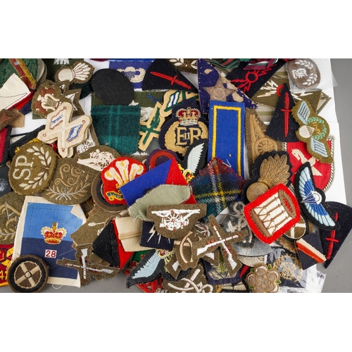 95 - A collection of mixed WW2 & Post War British Army and Civil Defence Cloth rank and trade insignia. A... 