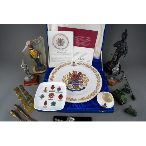 101 - A collection of British Royal Artillery Memorabilia to include, Commemorative China, Metal Figures a... 