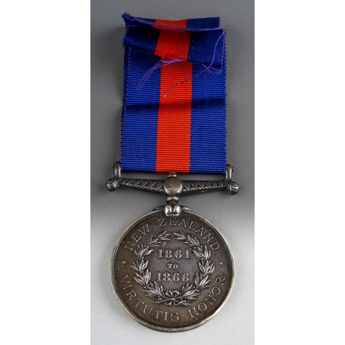 134 - Victorian New Zealand Medal 1861 to 1866 complete with a replacement ribbon. Name has been partially... 