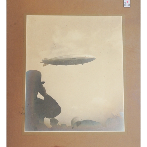 154 - A collection of 30 Zeppelin and Airship Postcards and photographs to include a large framed photo of... 