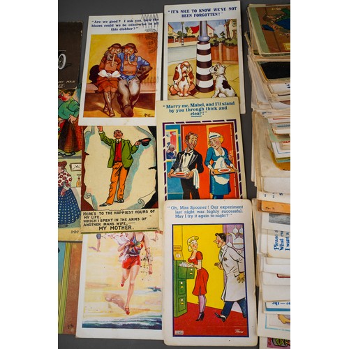 175 - A collection of approximatelyone hundred and eighty early to mid 20th century comical postcards, art... 