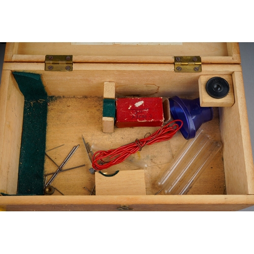 176 - A cased Bijou Major 450x students microscope, together with five boxed sets of NBS microslides and a... 