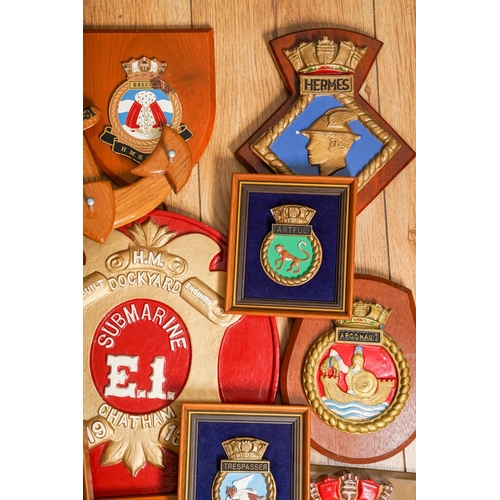 184 - A box containing eighteen items of Naval interest, including a quantity of Royal Navy ships crests o... 