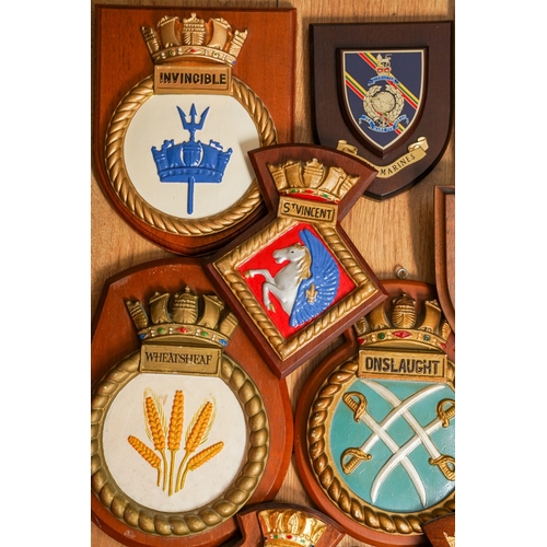 185 - A collection of eleven Royal Navy Ships crests of painted plaster and moulde in relief, including Fa... 