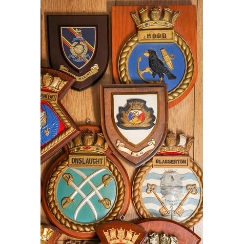 185 - A collection of eleven Royal Navy Ships crests of painted plaster and moulde in relief, including Fa... 