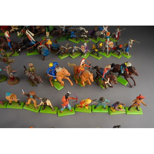 188 - Two boxes of Britains Deetail plastic and metal figures of cowboys and Native Americans, figures in ... 