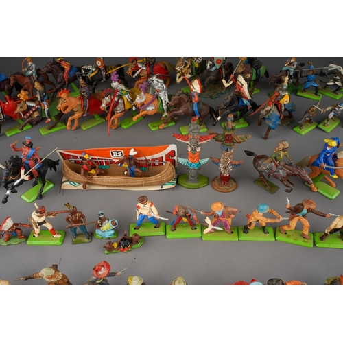 188 - Two boxes of Britains Deetail plastic and metal figures of cowboys and Native Americans, figures in ... 