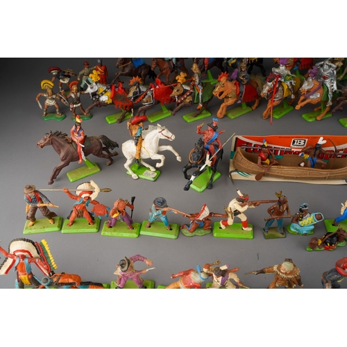 188 - Two boxes of Britains Deetail plastic and metal figures of cowboys and Native Americans, figures in ... 