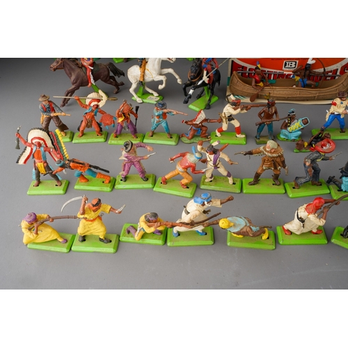 188 - Two boxes of Britains Deetail plastic and metal figures of cowboys and Native Americans, figures in ... 