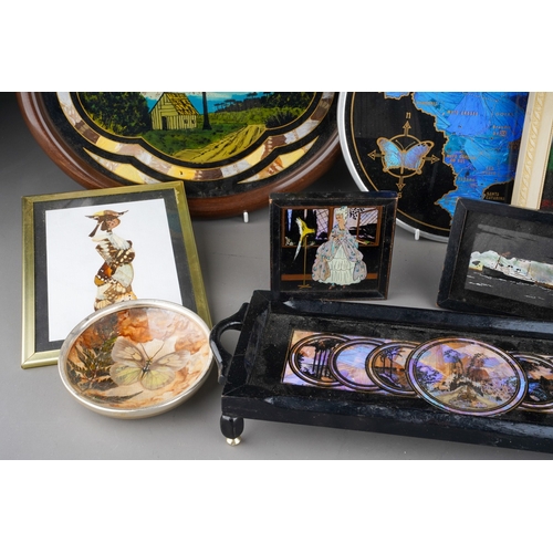 239 - A collection of butterfly wing trays, framed pictures and other souvenirs, etc, including a ship at ... 