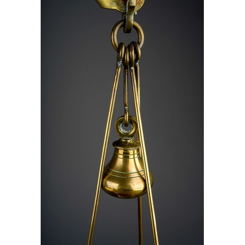 253 - An Edwardian Avery brass scales mounted with weights