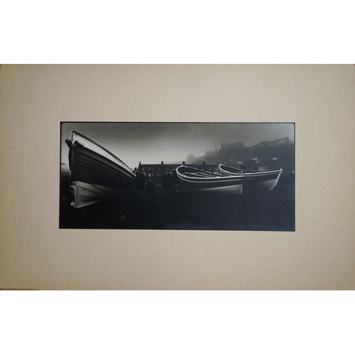 270 - Graham Smith (Middlesbrough, b.1947) 
Skinningrove (boats and houses)
monochrome photograph, 14 x 30... 