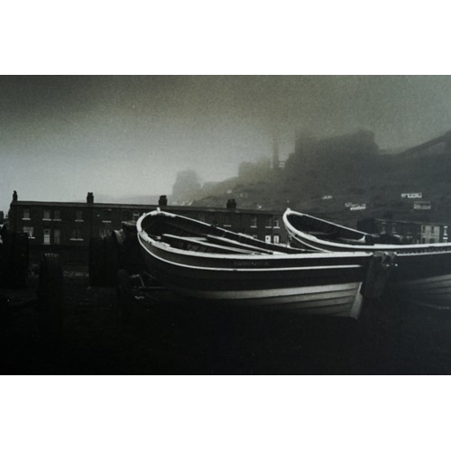 270 - Graham Smith (Middlesbrough, b.1947) 
Skinningrove (boats and houses)
monochrome photograph, 14 x 30... 