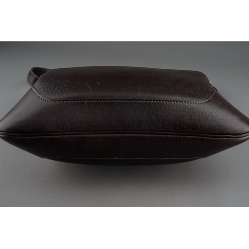 287 - A boxed Hermes Trim dark brown leather shoulder handbag, width 29.5cm, comes with cloth dust bag and... 