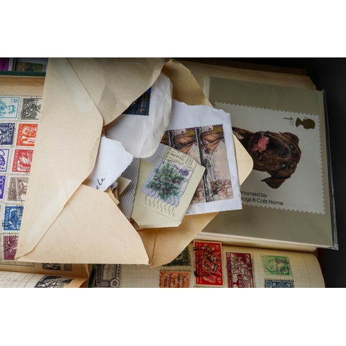 291 - A collection of QV to QE British and World stamps in four albums and loose, including a Boots stock ... 