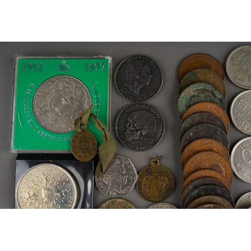 312 - A small tin of British and World coins, pre and post decimal, mostly 20th century, includes a NHS 50... 