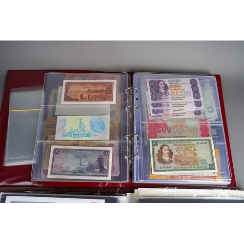 320 - Three folders of British and World banknotes, ten coin first day covers, other world coin sets and a... 