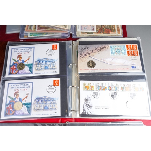 320 - Three folders of British and World banknotes, ten coin first day covers, other world coin sets and a... 