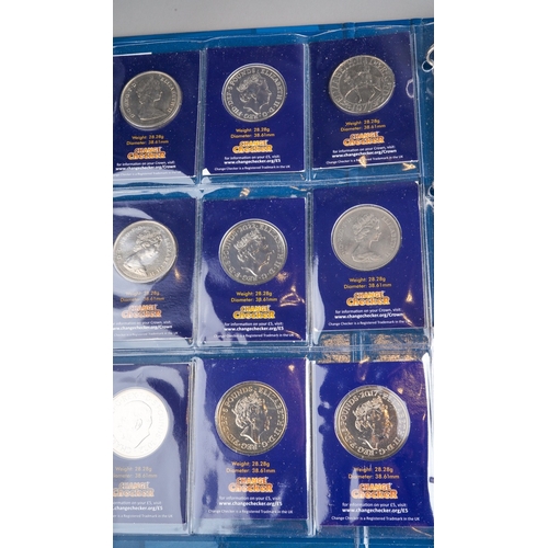 322 - An album of mostly modern coins, including a collection of Charles III Long to Reign over Us and Sta... 