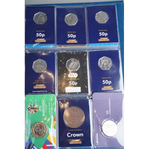 322 - An album of mostly modern coins, including a collection of Charles III Long to Reign over Us and Sta... 