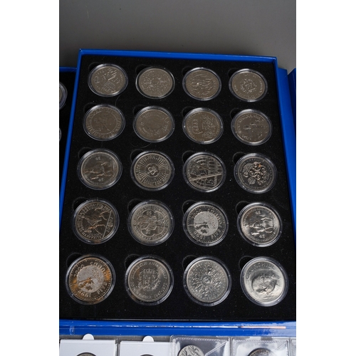 325 - Coins: Two folders and three loose sleeves of coins, mostly GB, including seven 1935 crowns, other c... 