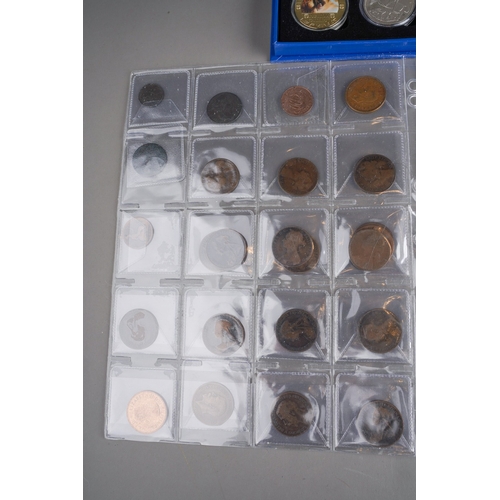 325 - Coins: Two folders and three loose sleeves of coins, mostly GB, including seven 1935 crowns, other c... 