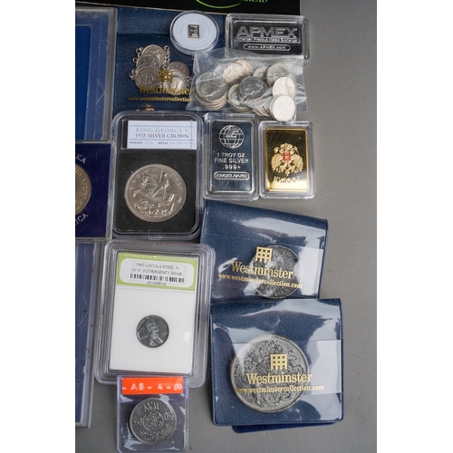 327 - A box of eleven GB coin sets, bank notes, Royal commemorative medallions, two 1 troy oz ingots of .9... 