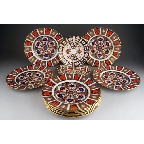 359 - A set of ten Royal Crown Derby 1128 Imari dinner plates, red backstamps together with matching veget... 