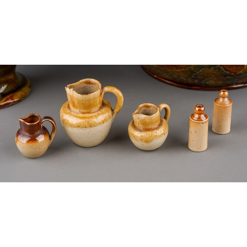 373 - Two pieces of Royal Doulton stoneware and five miniature salt glaze stoneware, the Royal Doulton com... 