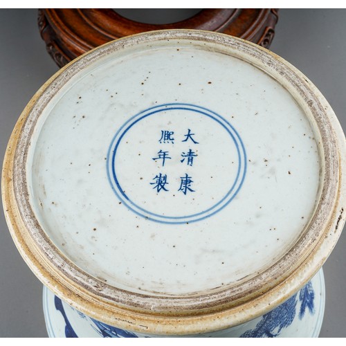 374 - A Chinese blue and white jardiniere, decorated with houses, rocks, water and birds in sky, six chara... 