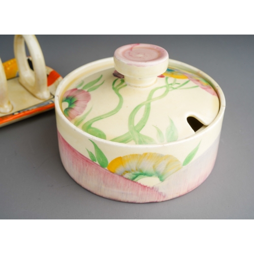 384 - A Clarice Cliff Bizarre five bar toast rack, black blindstamp and a Clarice Cliff Newport pottery 