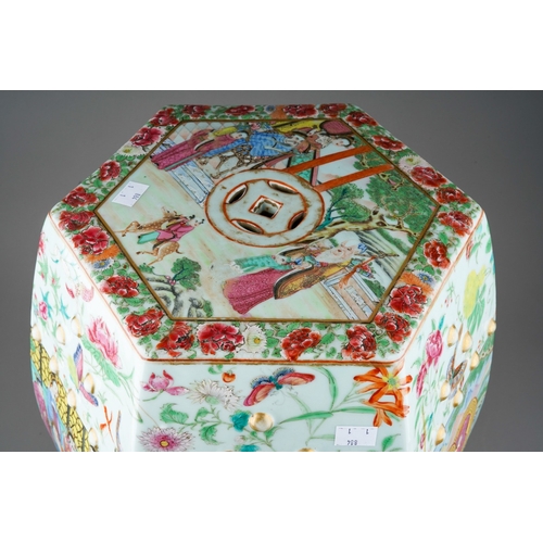 389 - An early 19th century Chinese Canton porcelain Famille Rose hexagonal garden stool, enamelled with b... 