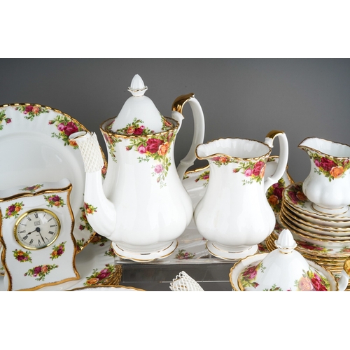 398 - Large collection of  Royal Albert Country Roses pattern tea and dinner wares to include coffee pot, ... 