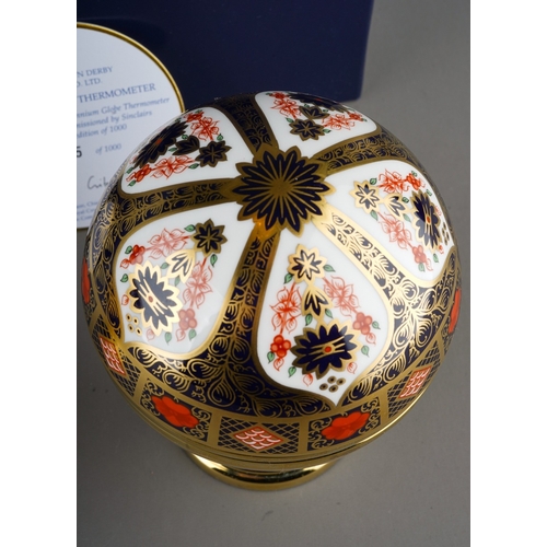 421 - Royal Crown Derby 11062 Millennium Globe Thermometer and Barometer in globular form, limited edition... 